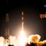 ISRO rocket launch at night with the ISRO logo in the foreground.