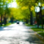 A blurry image of a street, depicting the effects of Myopia on distance vision.