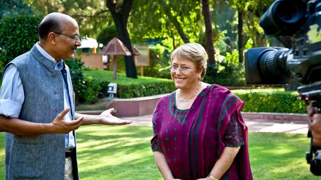 Shekhar Gupta, editor-in-chief of ThePrint, interviewing a woman outdoors, representing alternative media.
