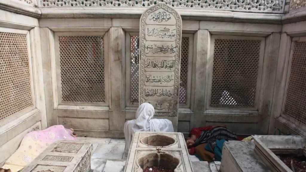 Tomb of Jahanara Begum with a simple marble grave, reflecting her humility and Sufi beliefs.